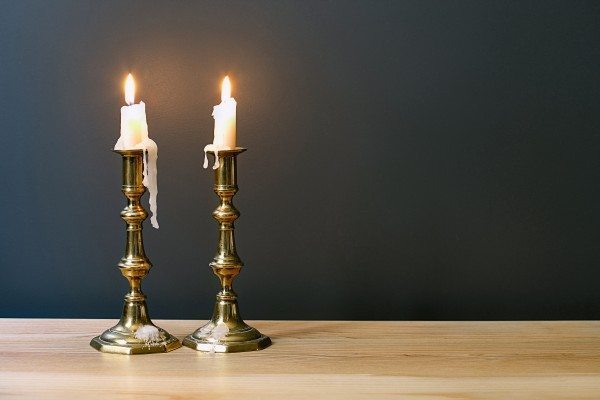 Retro Candelabra With Burning Candles In Minimalist Room